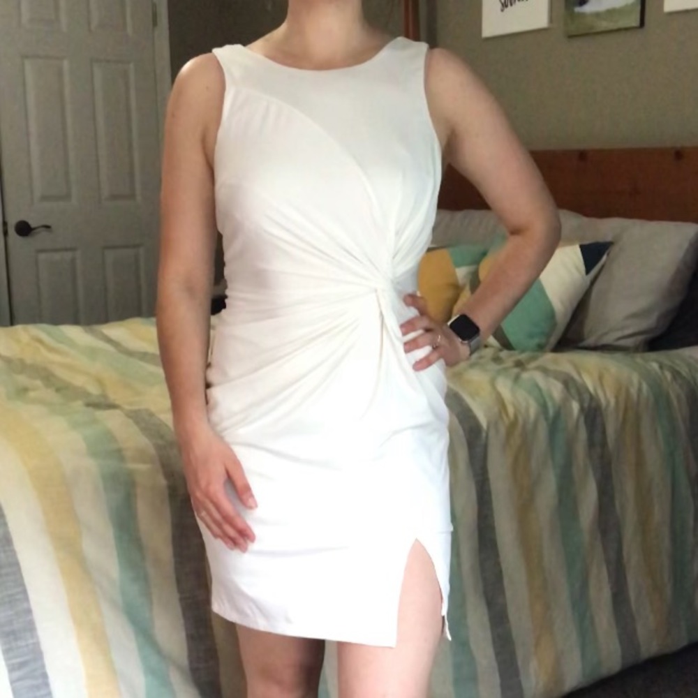 White dress with knot detail and slit
